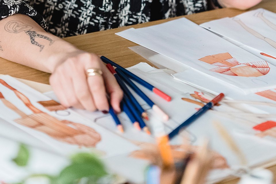 Girl Sketching Fashion Figures Design