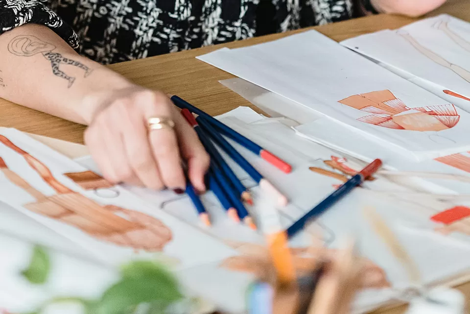 Girl Sketching Fashion Figures Design